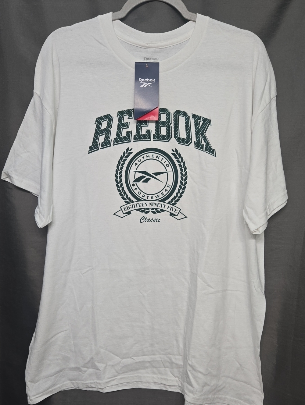 Reebok White Short Sleeve Tee with Dark Green Crest Logo